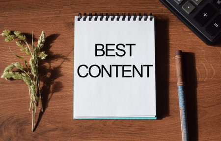 Text written on a Notepad on a business or financial topic. Top view of the calculator, documents, and desktop. Business conceptの写真素材