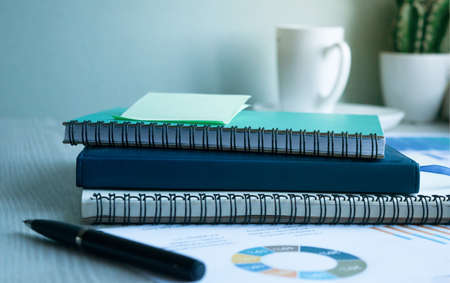 Business documents, business charts on the office table as a business workplace concept. Soft light.の写真素材