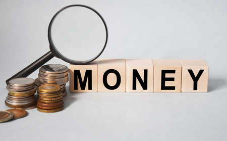The inscription ADMIN on wooden cubes isolated on a light background, the concept of business and finance.の写真素材