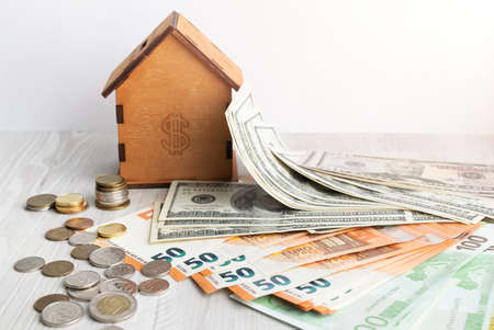 A man holds bills of money in his hand. Macro photography. The concept of the money market,...