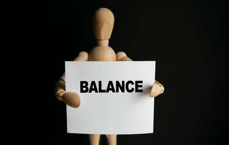 Notepad with the inscription Customer Retention. Conceptual image, business accessories, calculator isolated on the desktop. Finance or business concept.の写真素材