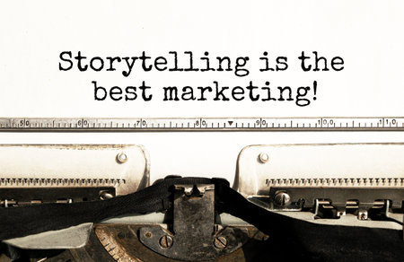 The text Storytelling is the best marketing is typed on paper by an antique typewriter. Vintage inscription, retro style, grunge, concept.の写真素材