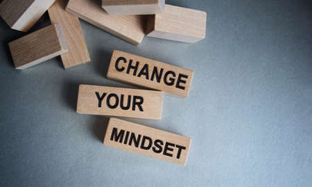The inscription JEGACY on wooden cubes isolated on a dark background, the concept of business and finance.の写真素材