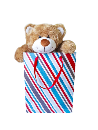 Teddy bear in the package is isolated on a white backgroundの写真素材
