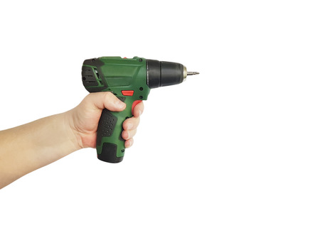 Man's hand holding drill, isolated on a white backgroundの写真素材