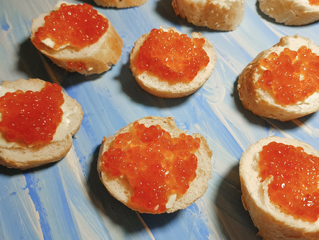 red caviar spoon plate, wooden blueの写真素材