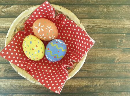 Easter eggs wooden, basketの写真素材