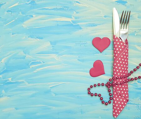 fork, knife, heart, blue wood backgroundの写真素材