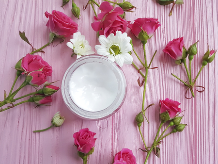 Cream cosmetic pink wooden roseの写真素材