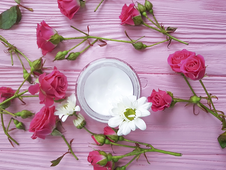 cosmetic cream, roses, pink woodenの写真素材