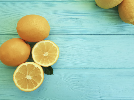 Lemons and oranges on blueの写真素材
