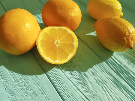 Lemons and oranges on blueの写真素材