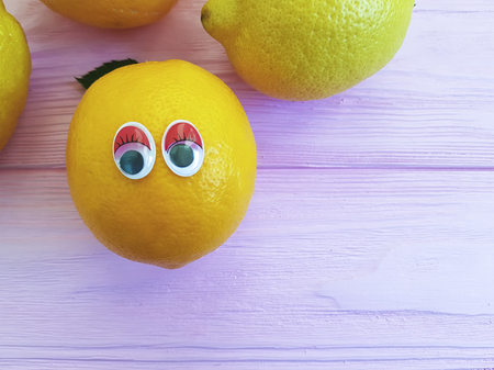 lemon orange cartoon eyes woodenの写真素材