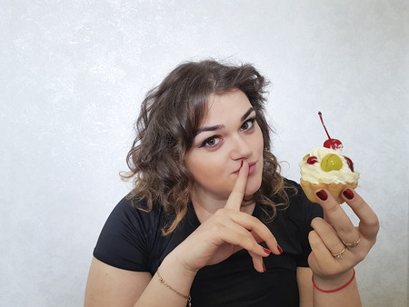 beautiful full girl with a cake