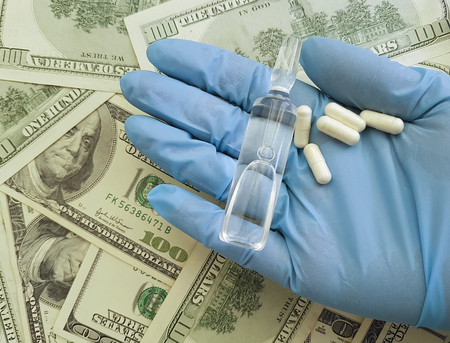 hand in gloves dollar pills