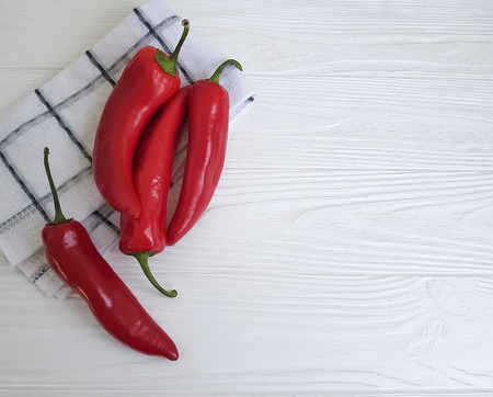 red pepper on a white wooden backgroundの写真素材