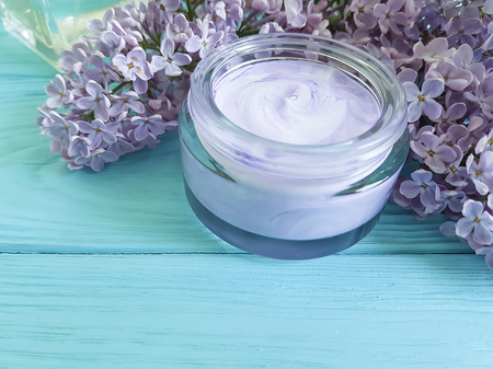 cream cosmetic lilac on blue wooden, anti aging, lifestyle,の写真素材