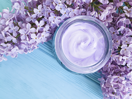 cream cosmetic lilac on blue wooden, anti aging, lifestyle,の写真素材