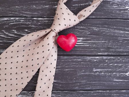 tie heart wooden backgroundの写真素材