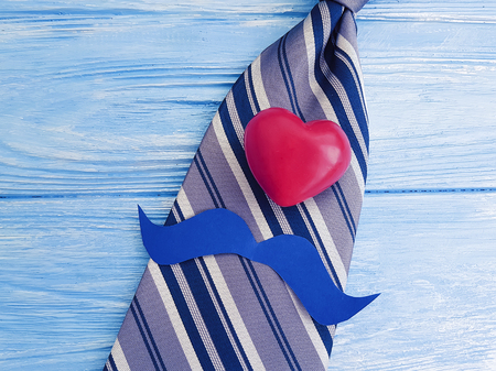 tie, heart, on a blue backgroundの写真素材