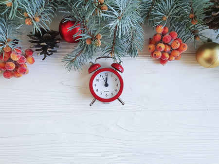 Christmas tree branch alarm clock on wooden