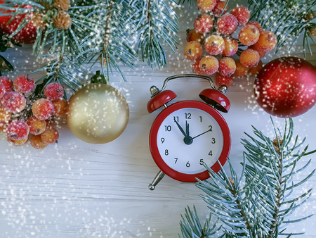 Christmas tree branch alarm clock on wooden