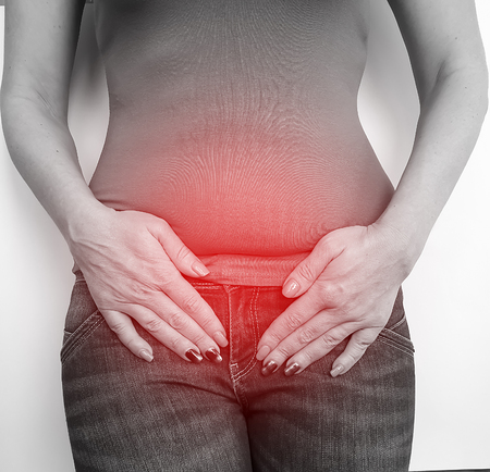 woman abdominal pain symptomの写真素材