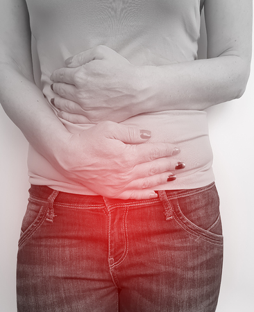 woman abdominal pain symptomの写真素材