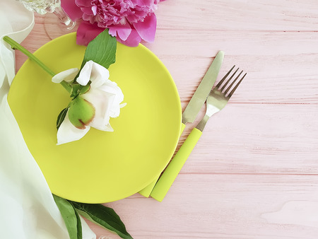 peony flower plate on pink woodenの写真素材