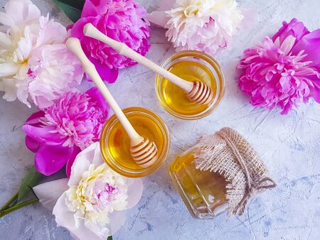 fresh honey peony flower on wooden backgroundの写真素材