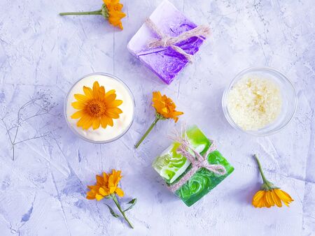 cosmetic soap, cream, salt calendula flowerの写真素材