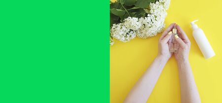 woman hands cream, flowerの写真素材