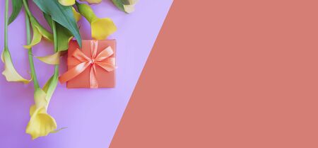 gift box calla flower on a colored backgroundの写真素材