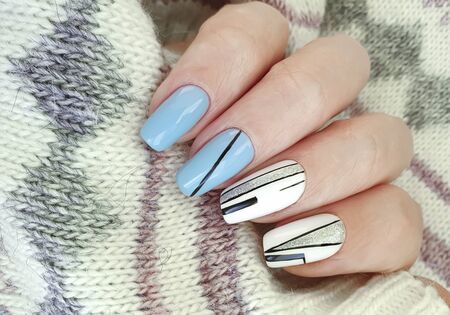 female hand nail beautiful manicure fur fashionの写真素材