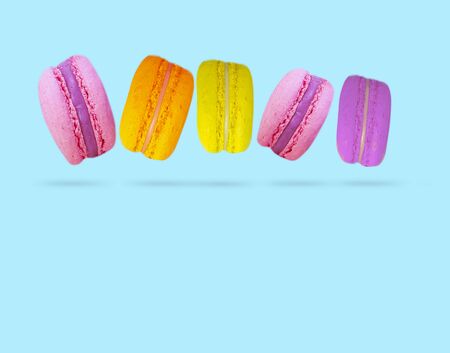 colored sweet macaroon flies background