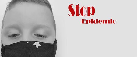 Boy portrait in a protective mask epidemicの写真素材