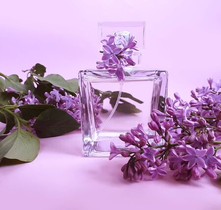 bottle perfume flower lilac background