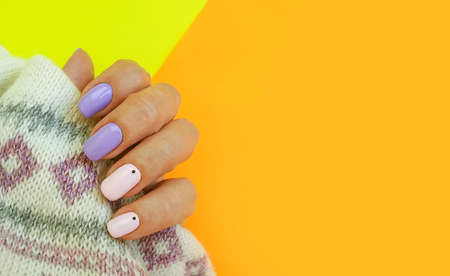 female hand nail beautiful manicure sweater elegant