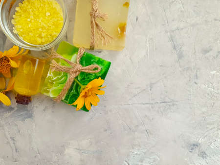 oil cosmetic soap calendula flower on concrete backgroundの写真素材