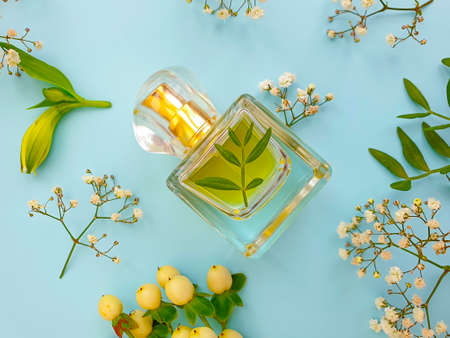 cosmetic cream, flower on on a concrete background