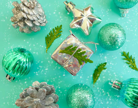 Christmas tree toy, branch on a colored background