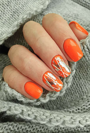 female hand beautiful colored manicure