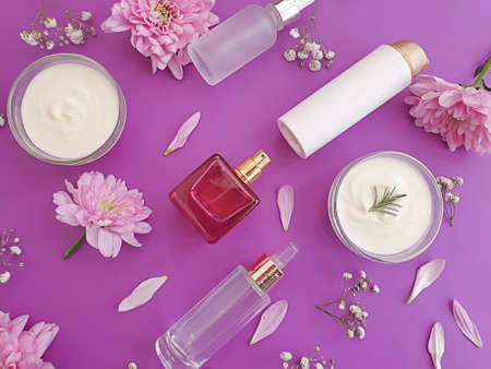 cosmetic cream, flower on a colored backgroundの写真素材