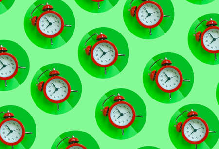 alarm clock on a colored background