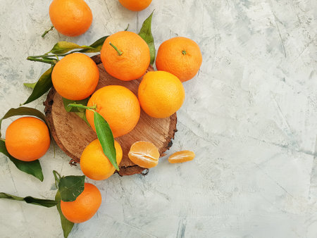 fresh tangerines on concrete backgroundの写真素材
