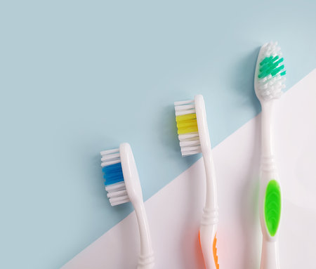 new toothbrush on a colored backgroundの写真素材