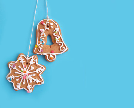 gingerbread christmas cookies on colored backgroundの写真素材