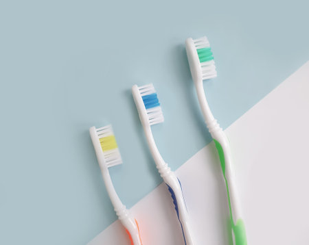toothbrushes on a colored background