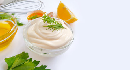 homemade mayonnaise, quail eggs, lemon on white backgroundの写真素材