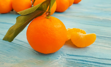 fresh tangerines on wooden backgroundの写真素材